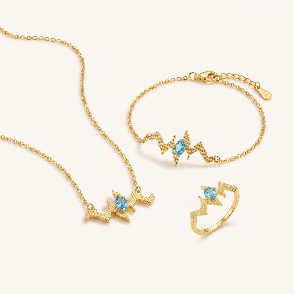 HEART OF LAND Birthstone Pulse Jewelry Set – Necklace, Bracelet & Ring Blue Topaz